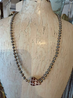 Pearl and Coneshell Necklace