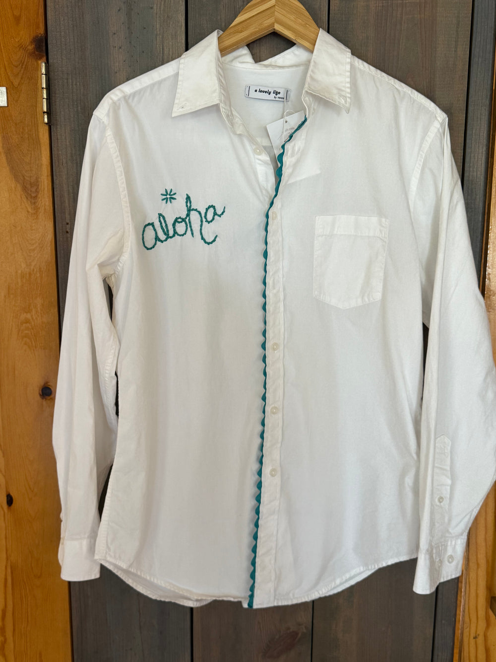 White Cotton with Turquoise AlOHA embroidered on front